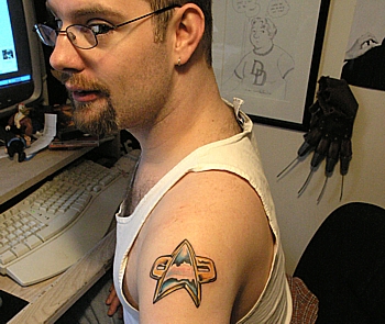 Impressive Small Star Trek Tattoo On Shoulder For Men