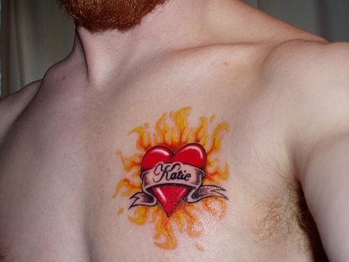 Katie Heart On Fire Flame Tattoo On Chest