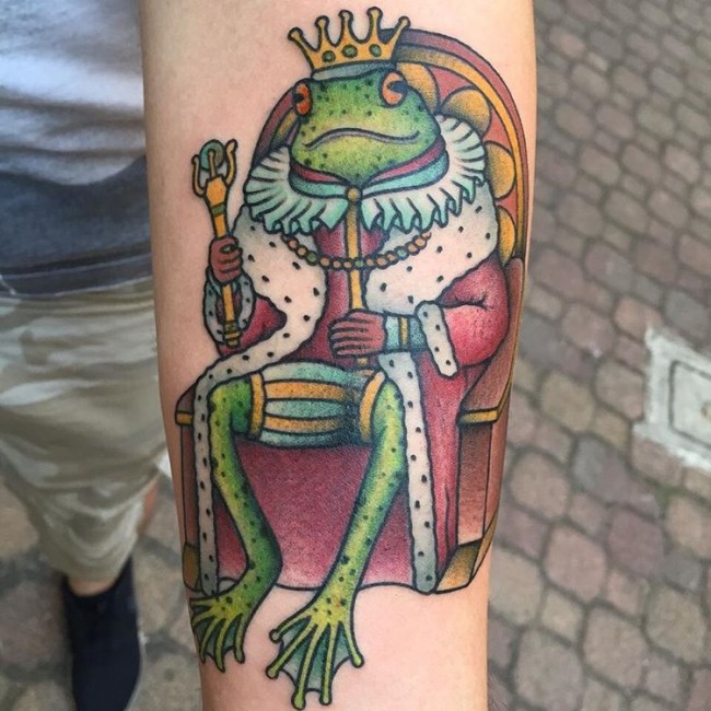 King Frog Cartoon Tattoo On Forearm