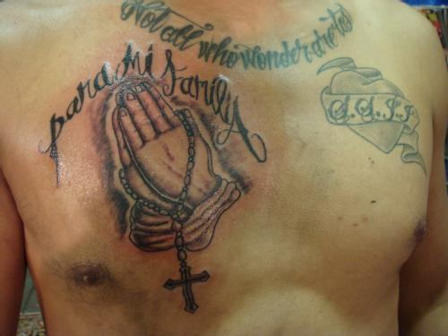 Latino Religious Tattoo On Chest