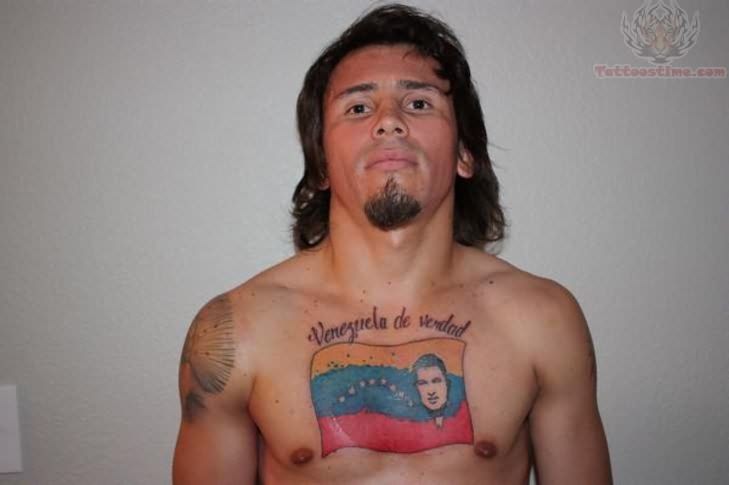 Latino Tattoo On Man Chest