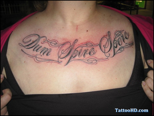 Latino Wording Tattoo On Chest For Girls