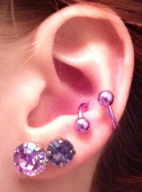 Left Ear Double Lobe And Outer Conch Piercing With Circular Barbell