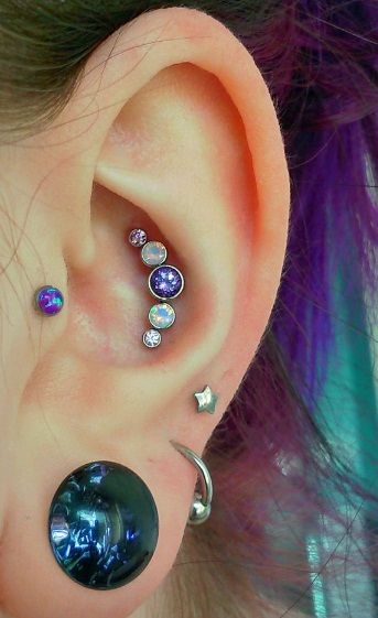Left Ear Lobe And Outer Conch Piercing For Girls