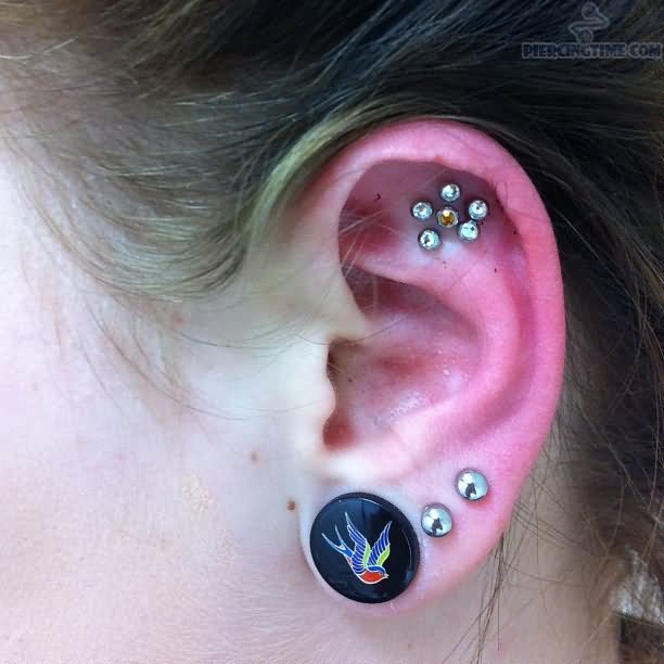 Left Ear Triple Lobes And Outer Conch Piercing