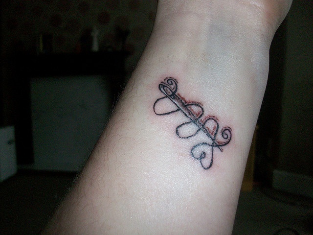 Love Sewing Needle Tattoo On Wrist