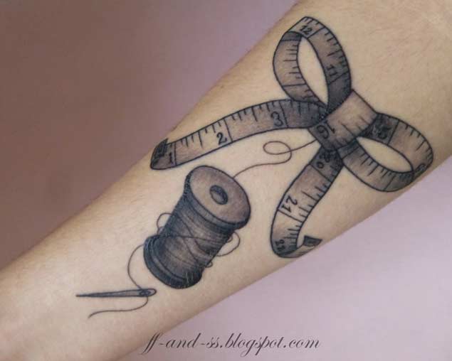 Measuring Tape Bow Sewing Tattoo On Forearm