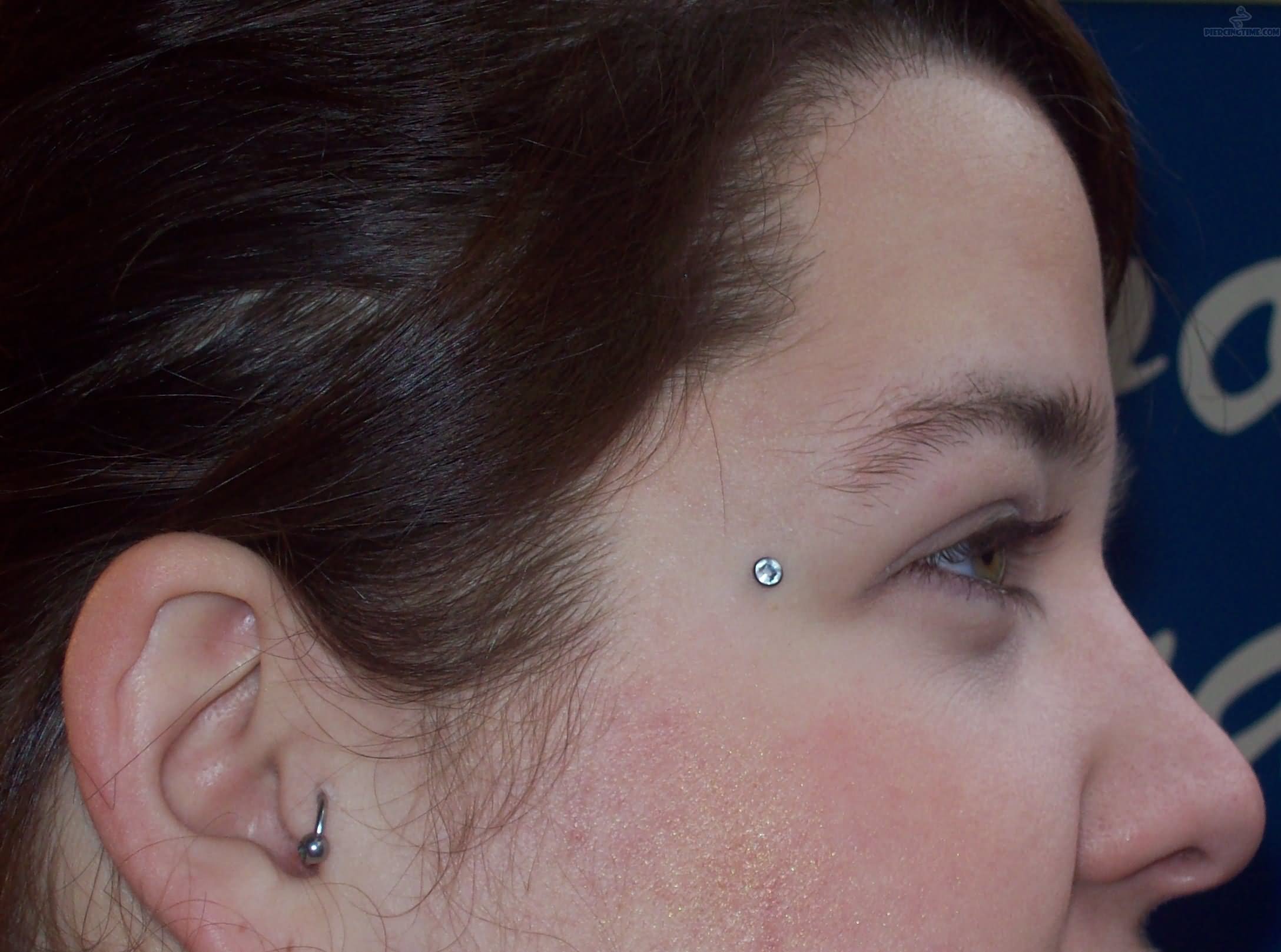 Dermal piercing Pictures Removal Infected Pain Micro Dermal Face Piercing. 