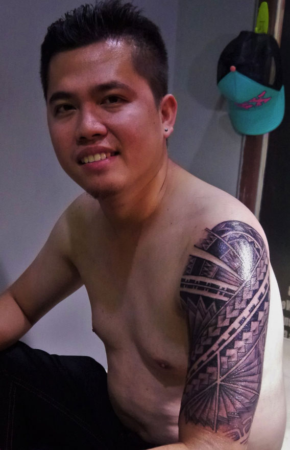 Nice Filipino Tribal Tattoo On Man Left Sleeve