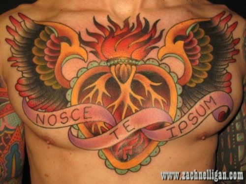 Nice Flame Heart Tattoo On Chest For Men