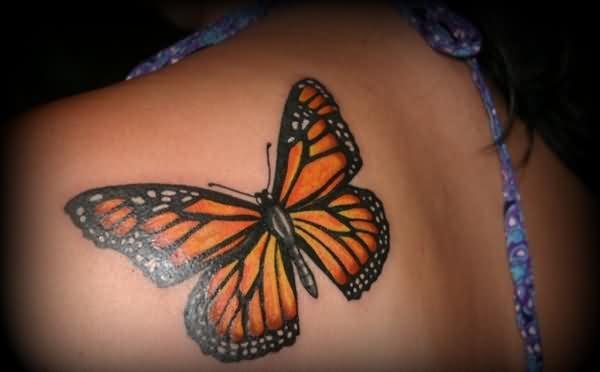 Nice Monarch Butterfly Tattoo On Girl Back Shoulder