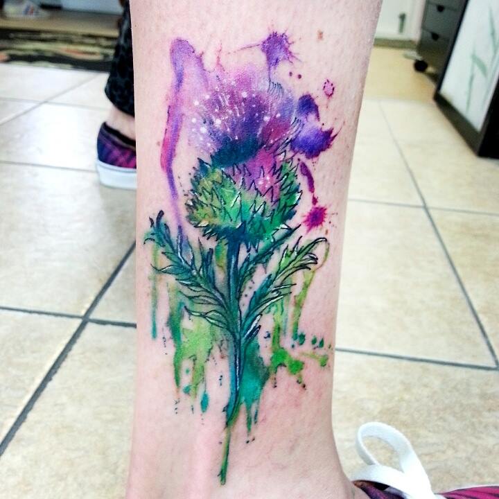 Nice Watercolor Scottish Thistle Tattoo On Leg