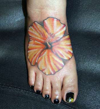 Orange Hibiscus Flower Tattoo On Right Foot