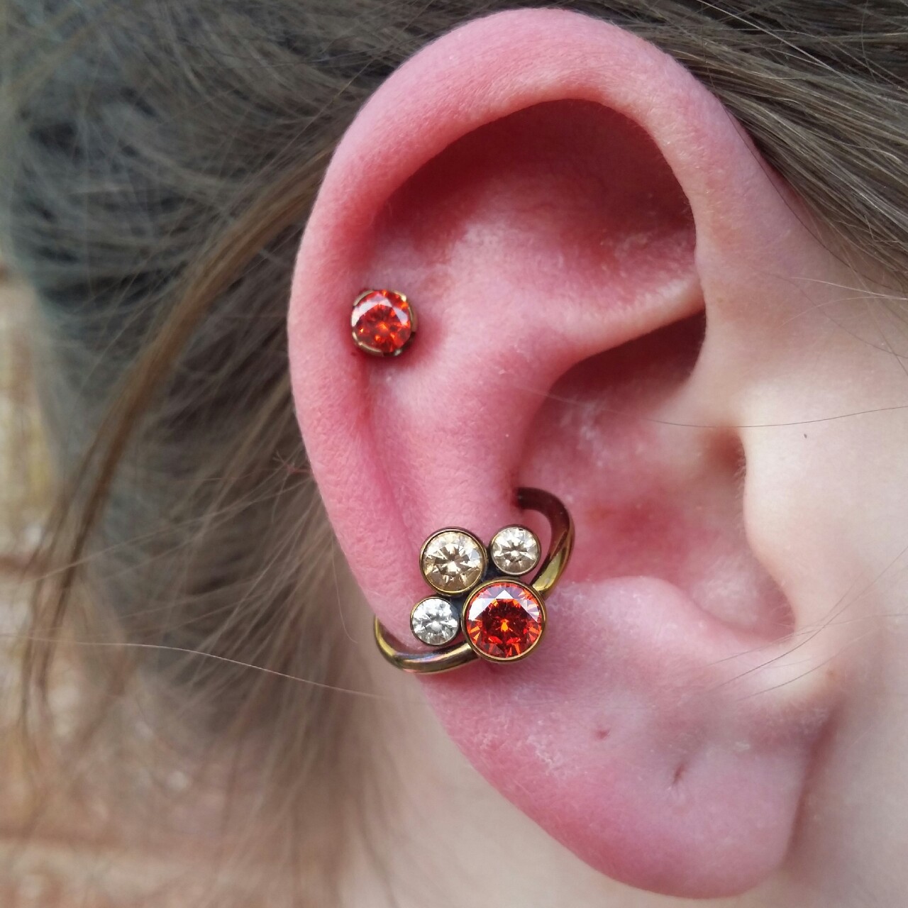 Outer Conch Piercing On Girl Right Ear