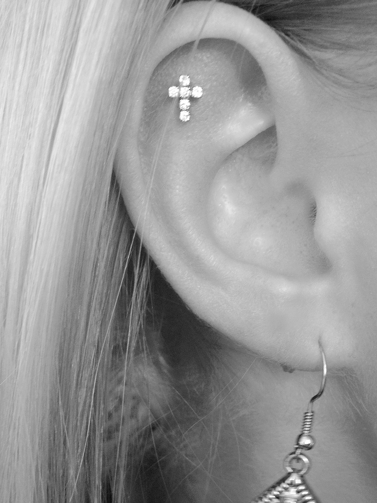 Outer Conch Piercing With Cross Stud