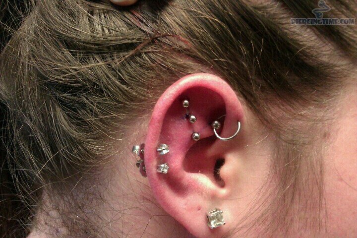 Outer Conch Piercing With Gem Studs