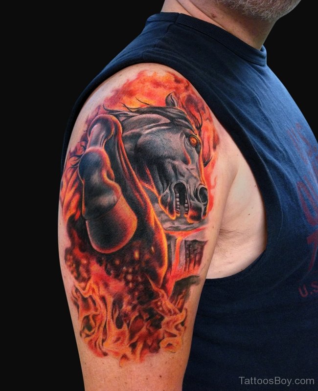 Outstanding Flaming Horse Tattoo On Shoulder