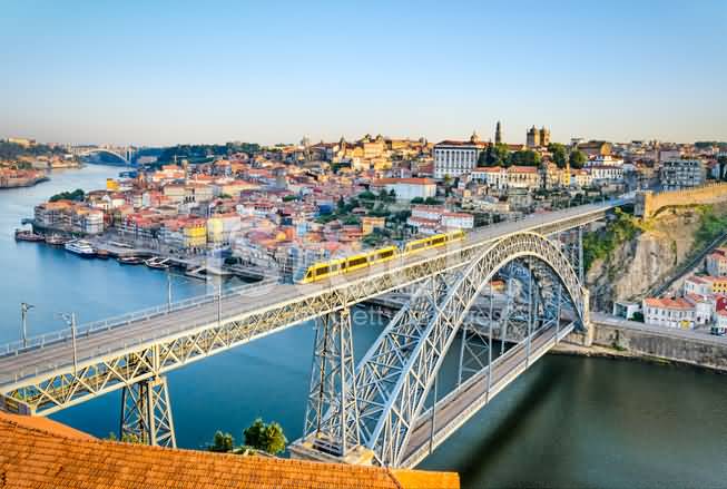 Porto City With Dom Luis Bridge In Portugal