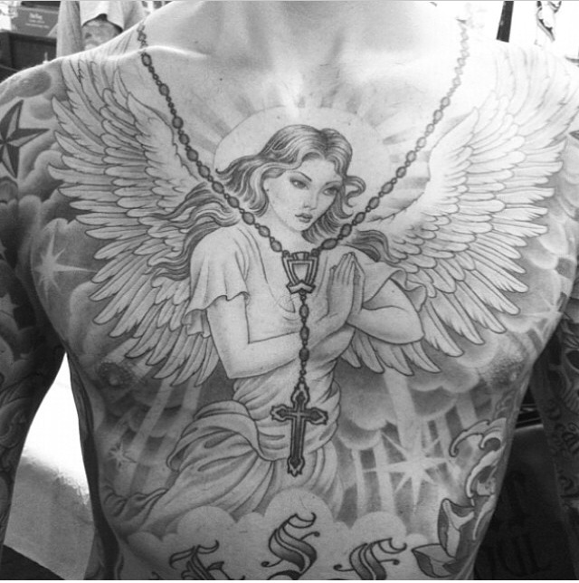 Praying Angel And Rosary Tattoo On Man Chest by Chris Garver