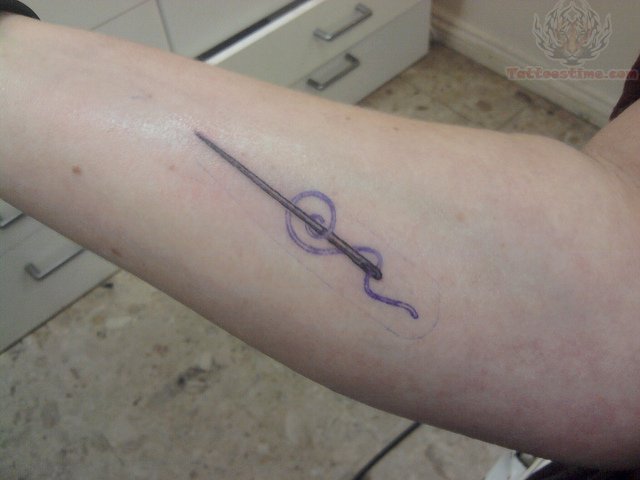 Purple Thread Sewing Needle Tattoo On Arm Sleeve