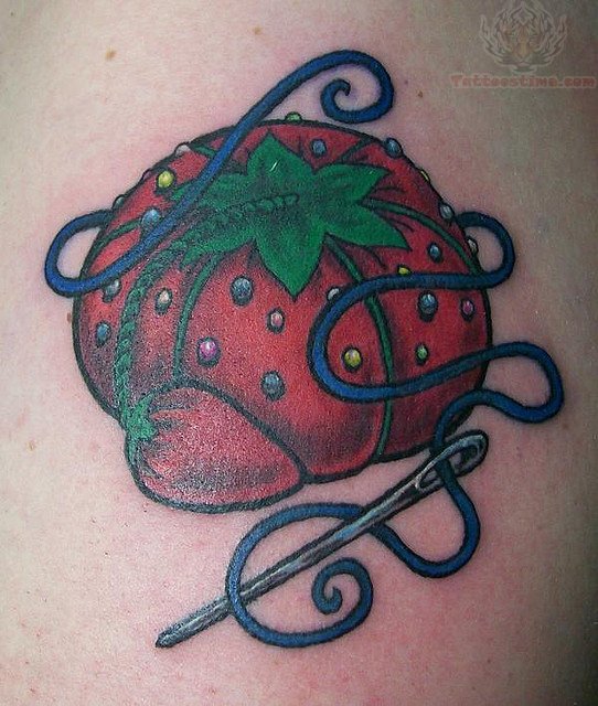 Red Pincushion With Sewing Needle Tattoo