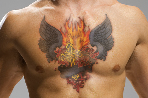 Religious Flame Symbol Tattoo On Man Chest