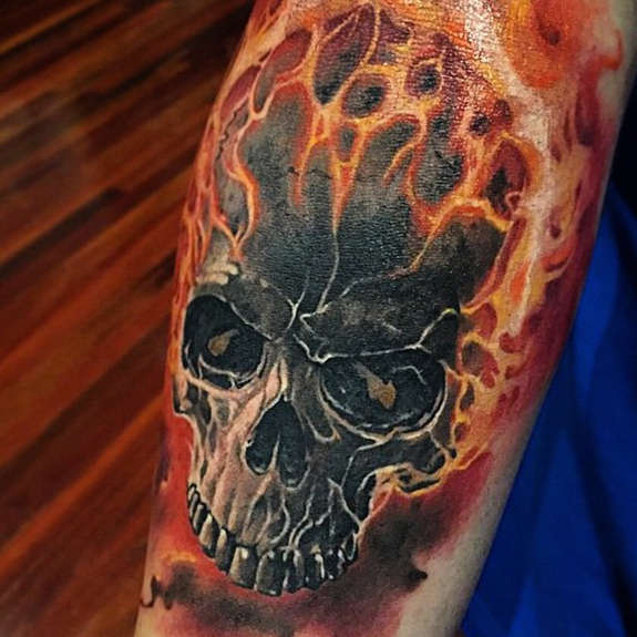 Scary Flame And Skull Tattoo On Arm