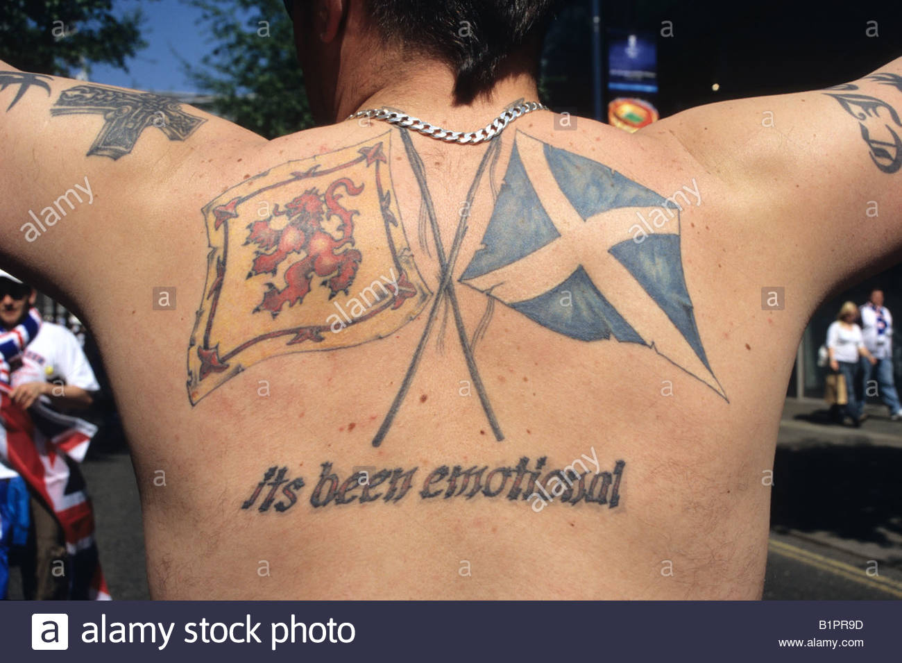 Scottish Flags Tattoo On Upper Back