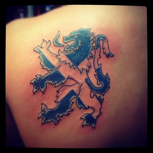 Scottish Lion Symbol Tattoo On Back Shoulder