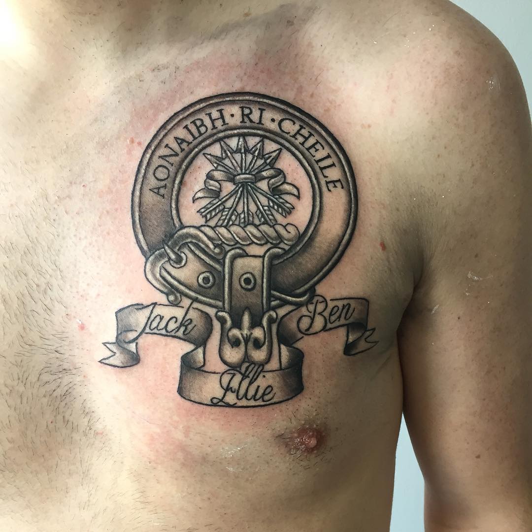 Scottish Logo Tattoo On Man Chest