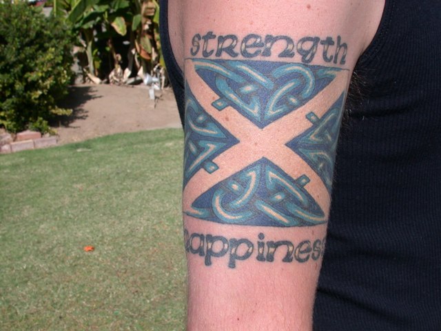 Scottish Strength And Happiness Tattoo On Half Sleeve