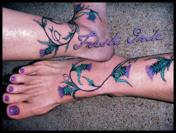 Scottish Thistle Flowers Tattoos On Girl Legs