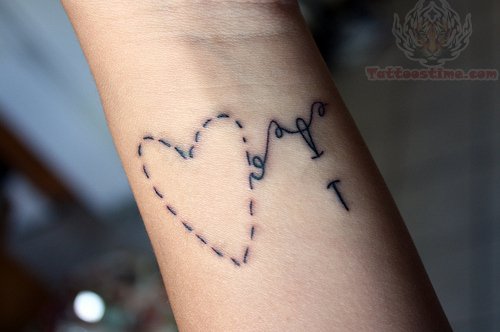 Sewing Heart Needle And Thread Tattoo On Wrist