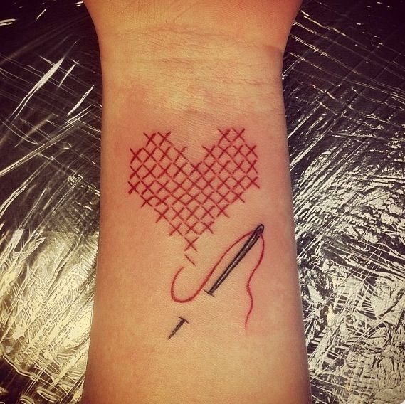 Sewing Heart Tattoo On Wrist