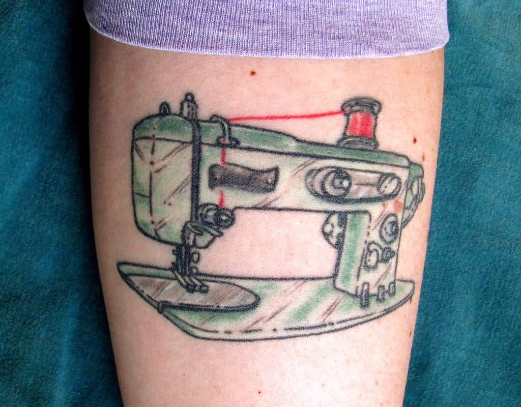 Sewing Inspired Tattoo On Arm