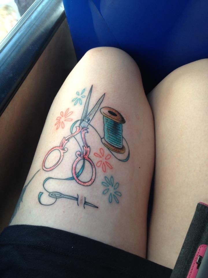Sewing Spool And Scissor Tattoo On Thigh
