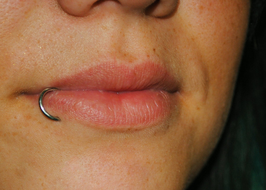 Side Labret Piercing With Silver Round Ring