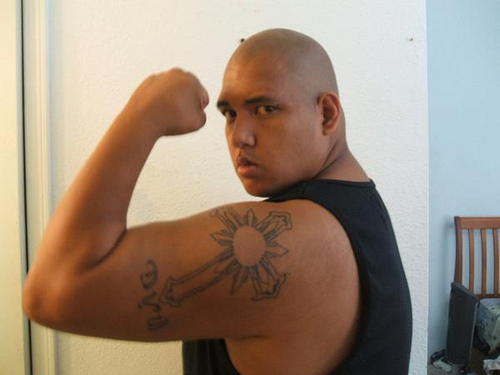 Simple Filipino Sun Cross Tattoo For Men