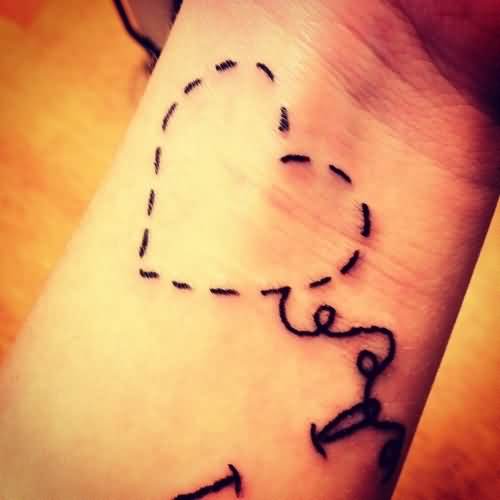 Small Heart Sewing Tattoo On Wrist