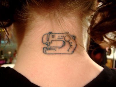 Small Sewing Machine Tattoo On Nape For Girls