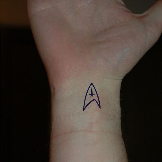 Small Star Trek Logo Tattoo On Wrist
