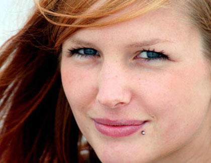 Smiling Girl With Side Labret Piercing
