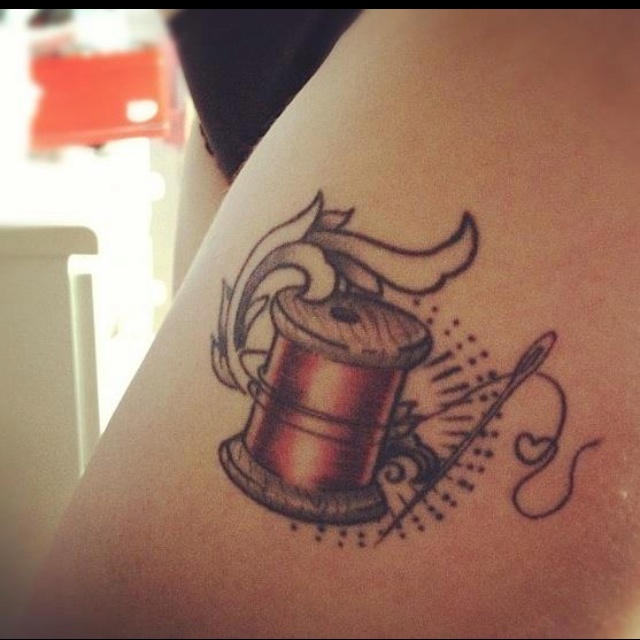 Spool With Sewing Needle Tattoo