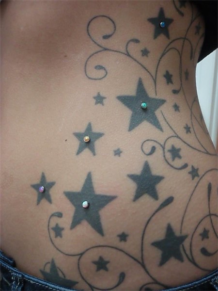 Star Tattoos And Microdermal Piercing