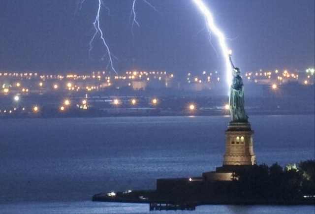 Statue Of Liberty And Lightening View