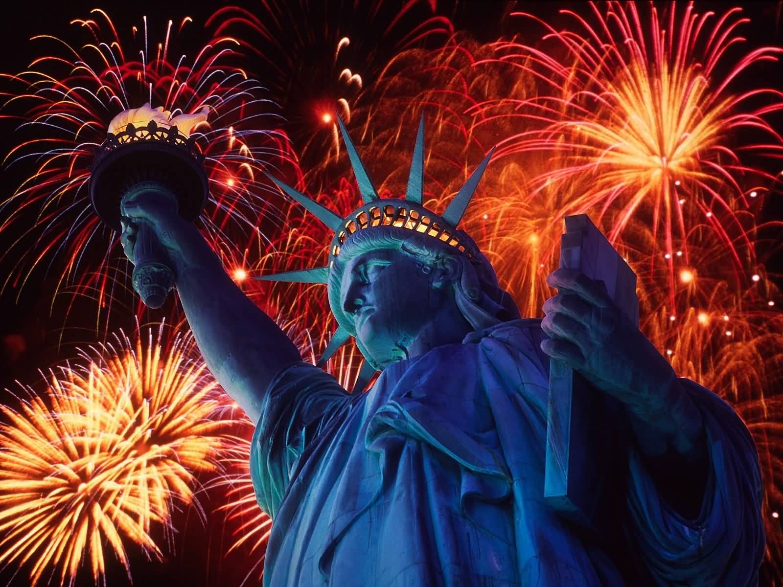 Statue Of Liberty With Fireworks At Night