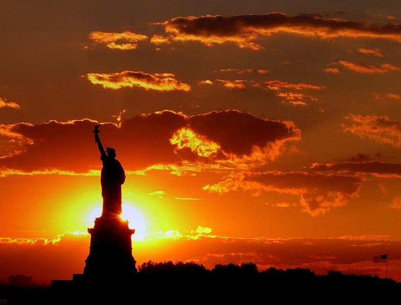 Sunset View Of Statue Of Liberty