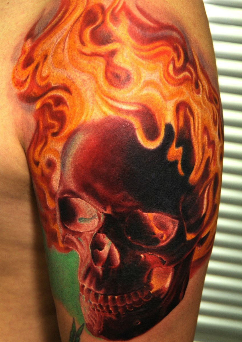 Terrific Flame Skull Tattoo On Shoulder By Andy Engel