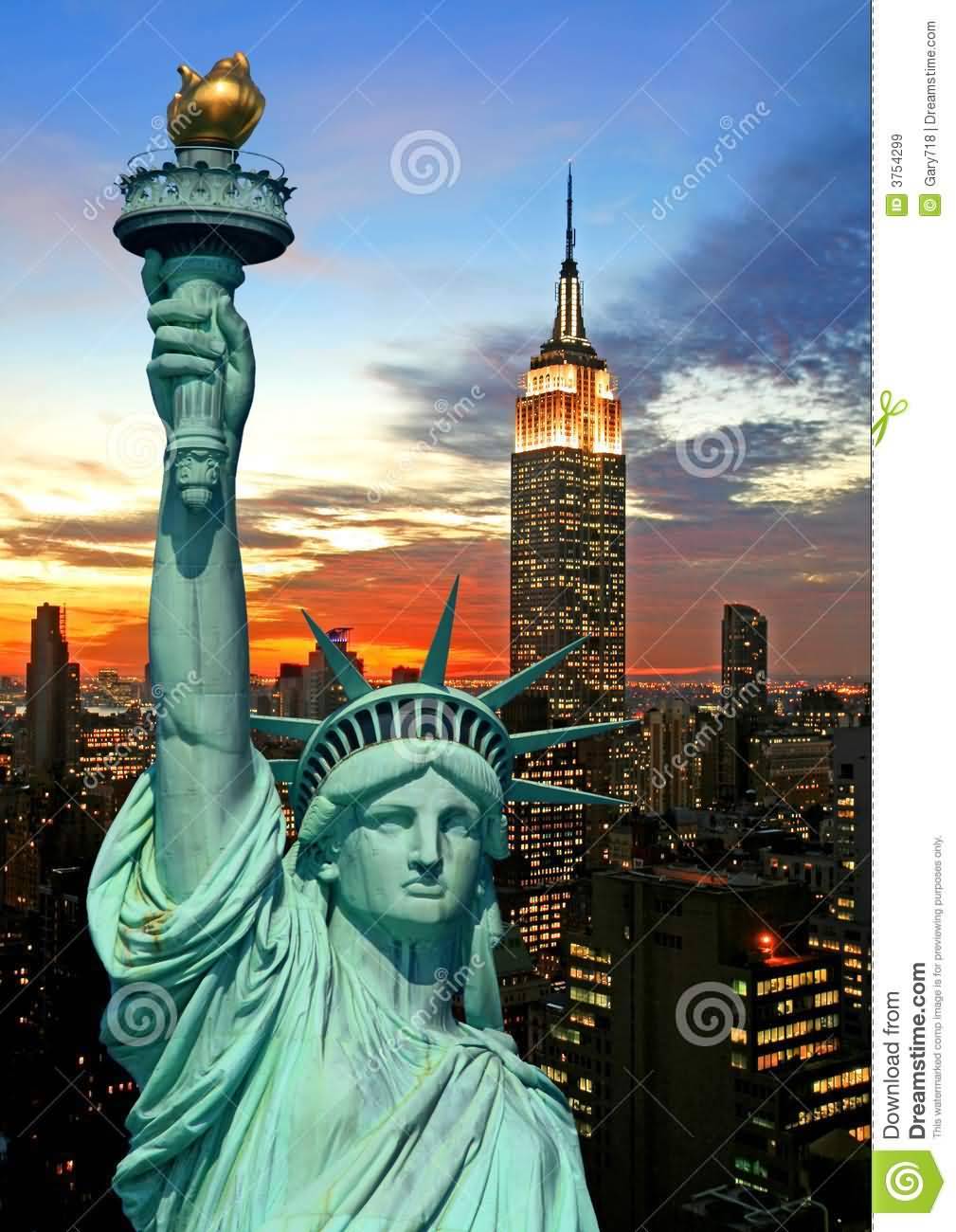 The Statue Of Liberty And New York City Skyline