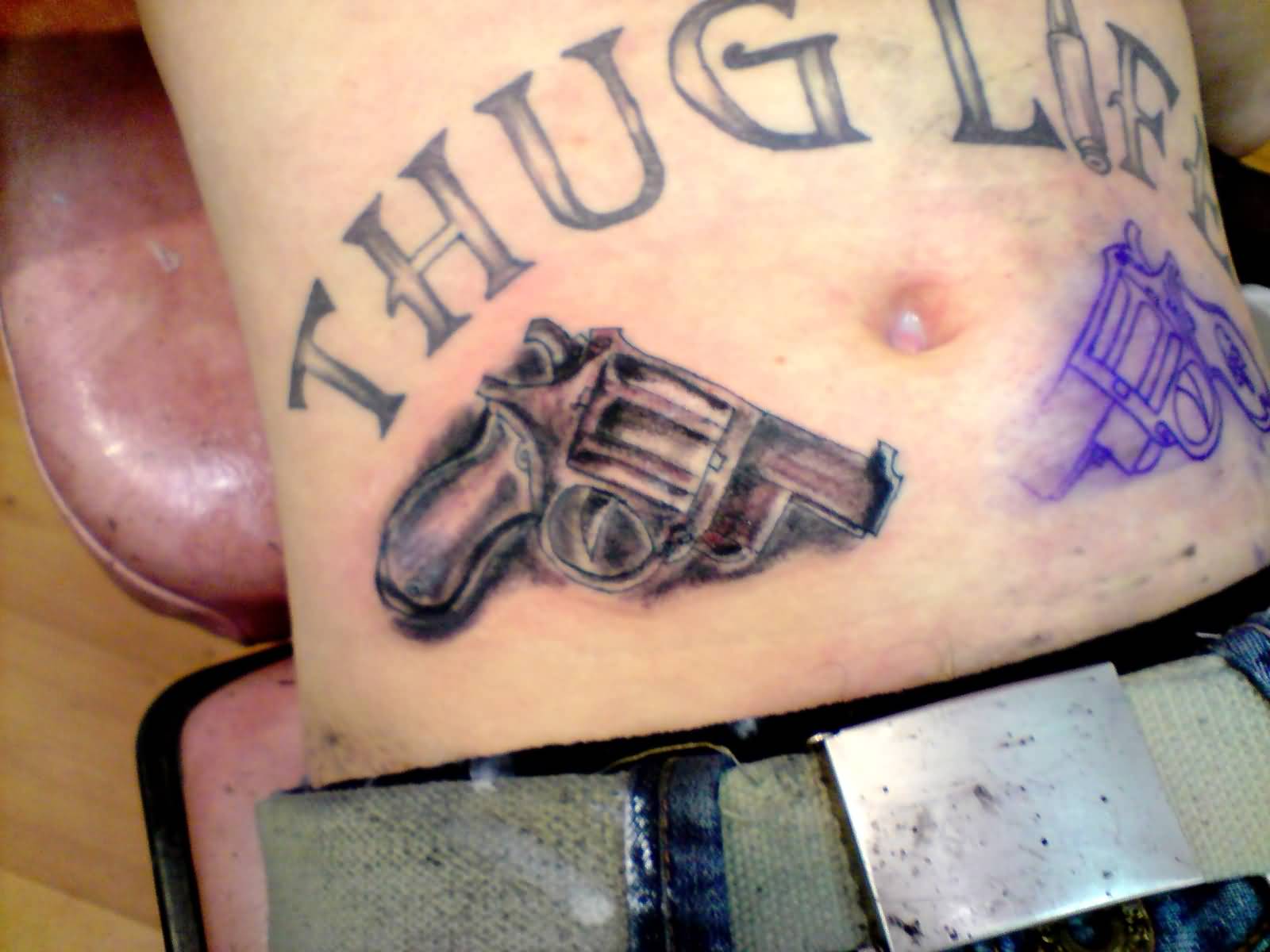 Thug Life Gun Tattoo Around Belly